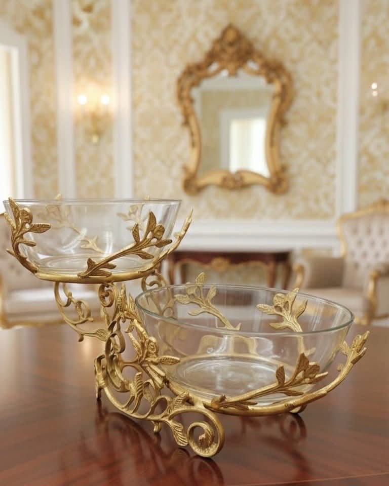Luxury gold roll-top chafing dish pair with steaming food on marble surface