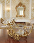 Luxury gold roll-top chafing dish pair with steaming food on marble surface