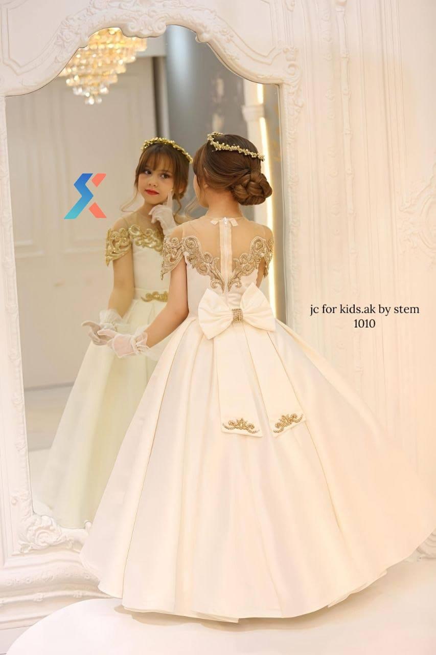 Girls burgundy wine luxury ball gown side view
