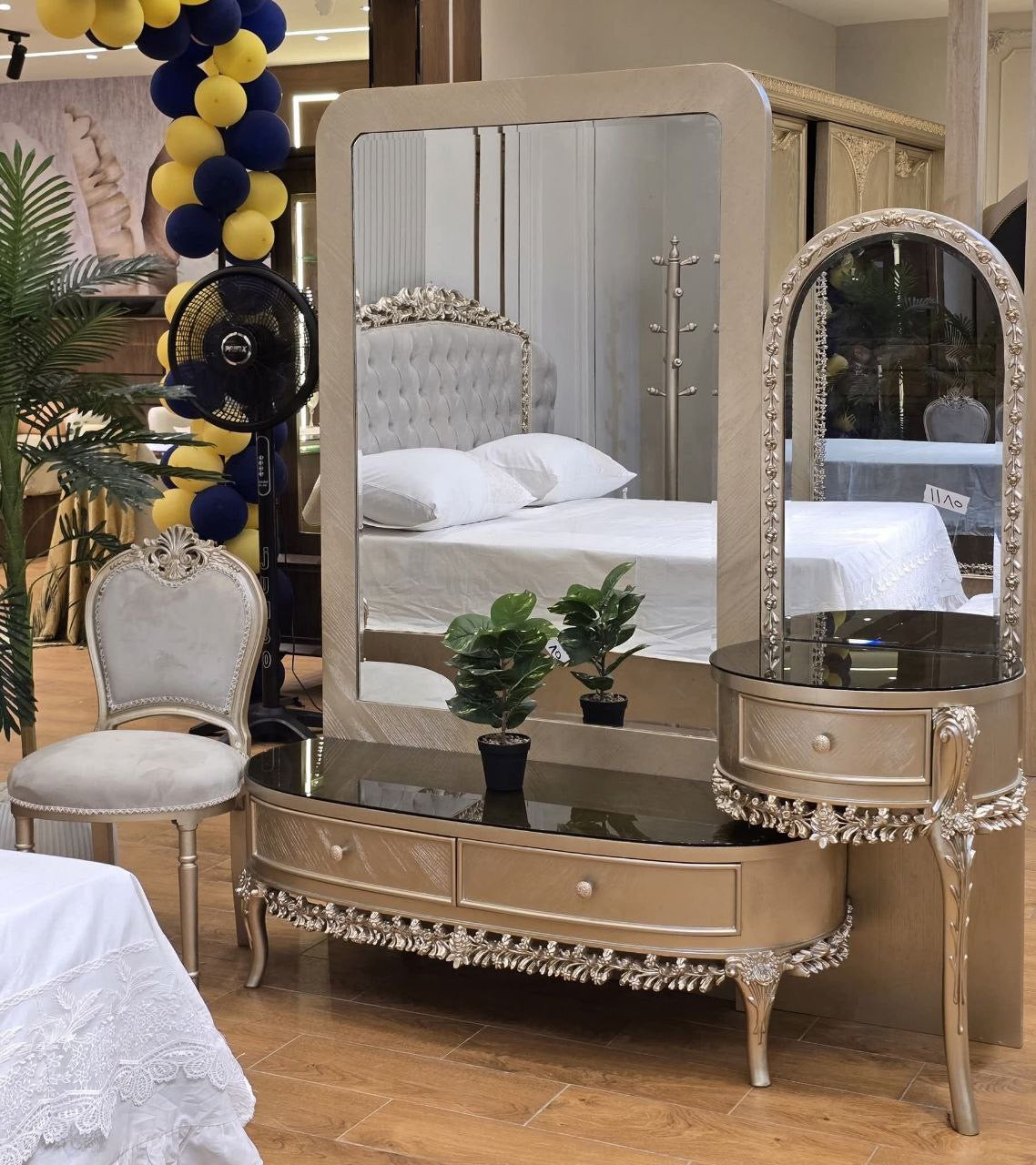Baroque arched nightstand with black glass top and gold hardware - side view