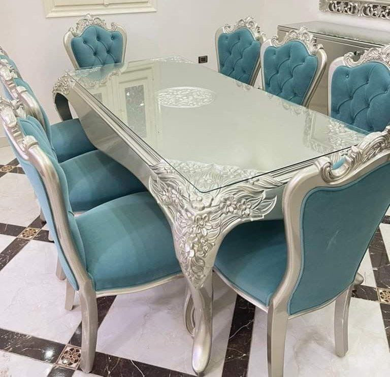 Teal tufted baroque dining chair with silver carved frame detail